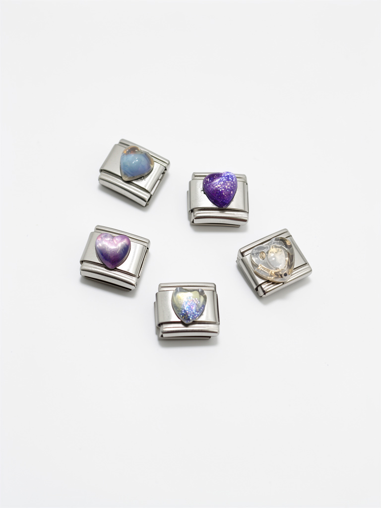 Charms de corazón tornasol