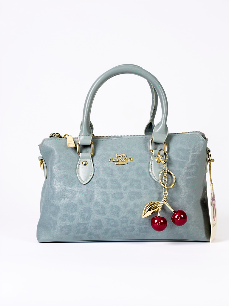 Bolso COACH celeste