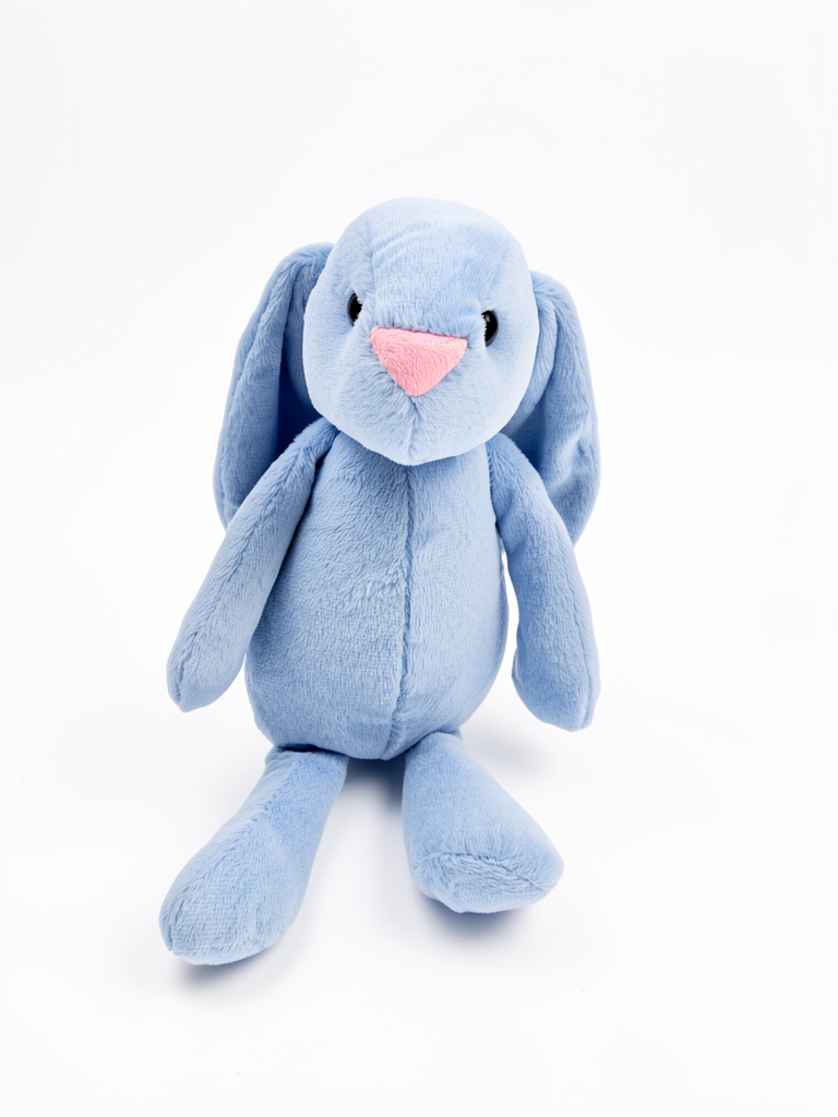 Conejo azul de peluche