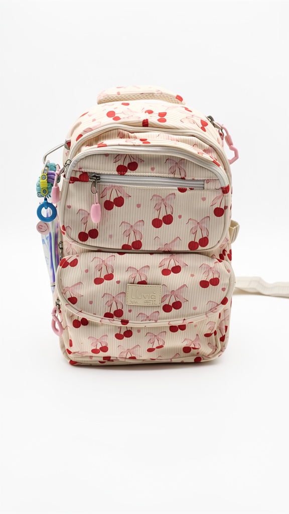 Mochila primaria beige con cerezas