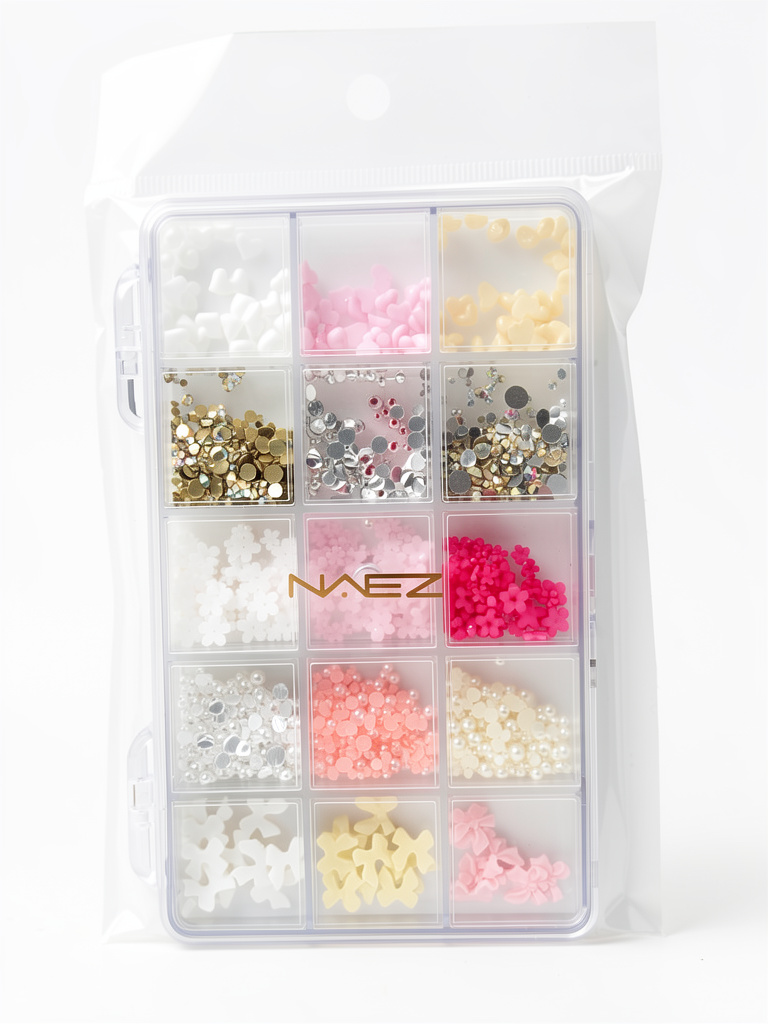 Decoración Naez surtida (strass, moños, flores, corazones y perlas) x15 divisiones