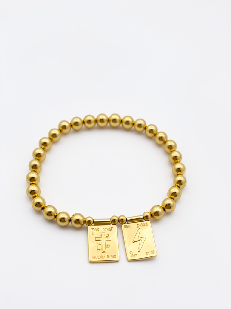 Pulsera dorada con dije