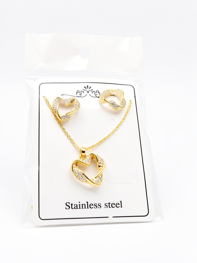Arete y collar corazon dorado