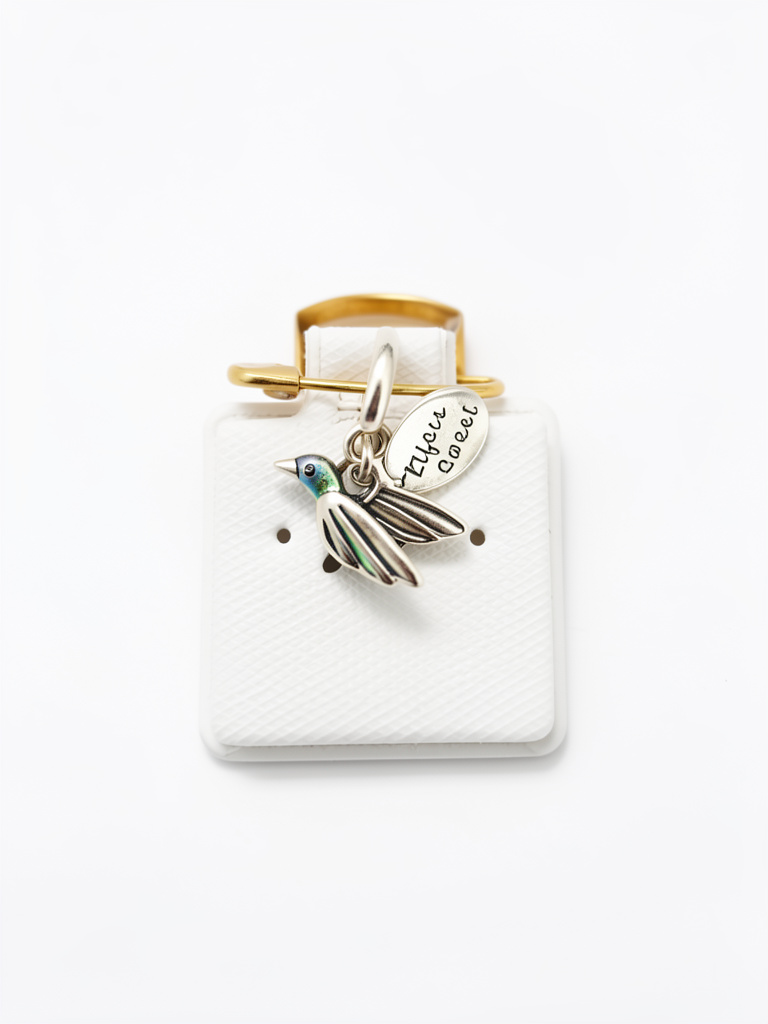 M12218 Charm colibrí