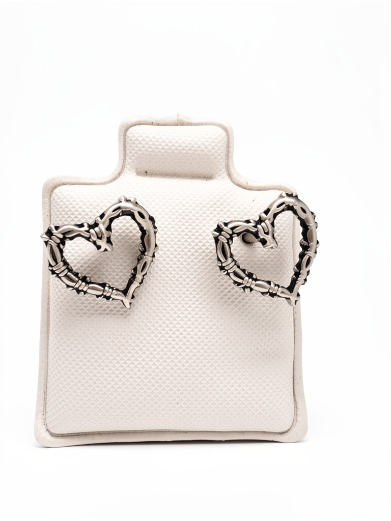 M11507 Broquel Corazón espinas