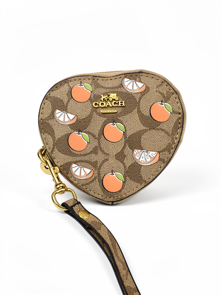 CARTERA/MUÑEQUERA COACH CAFÉ CORAZON