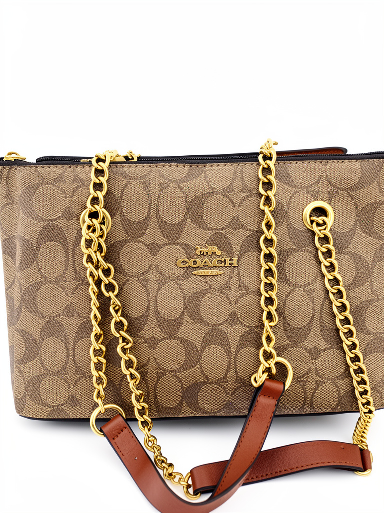 BOLSA COACH CAFÉ CON CADENA  Y ZIPER