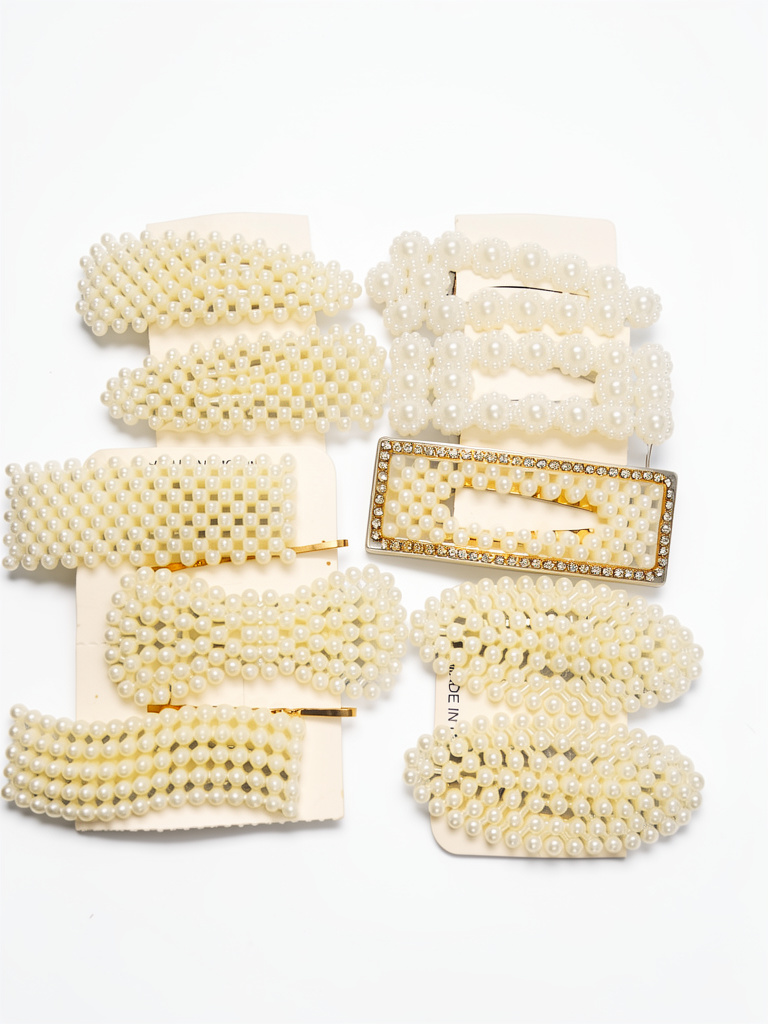 Hebillas con perlas  5 cm x unidad