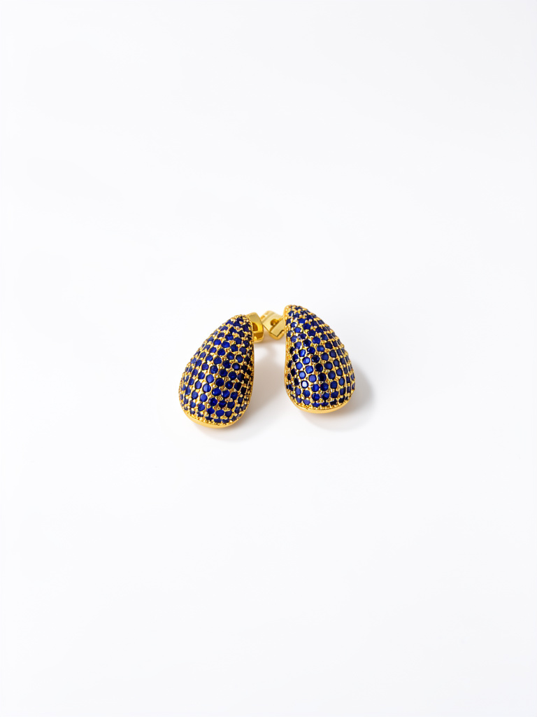 Gotas doradas con cristal azul rey