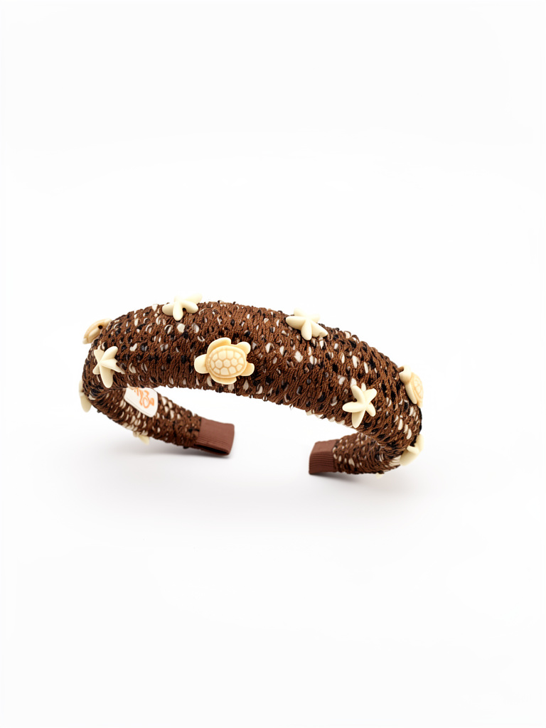 Diadema tweed marron apliques estrellas marinas y tortugas