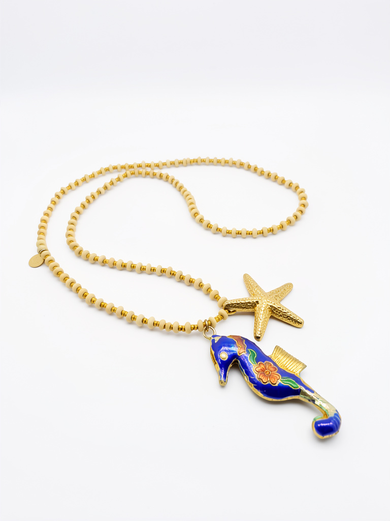 Collar largo piedra turquesa blanca dijes estrella y caballito de mar