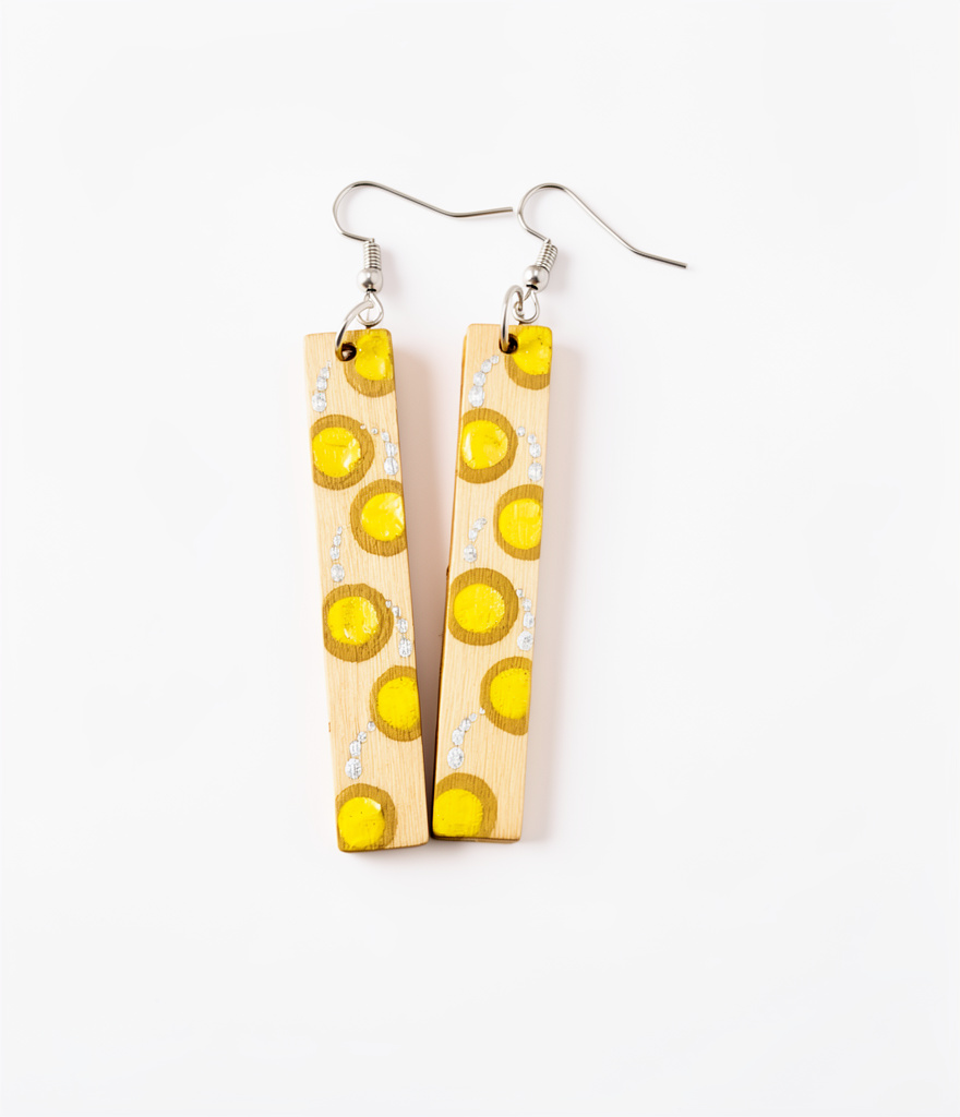 Arete línea puntos amarillo