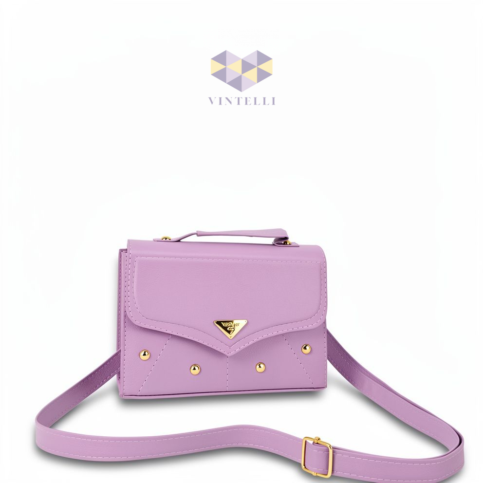 Bolso tipo cartera lila con correa larga