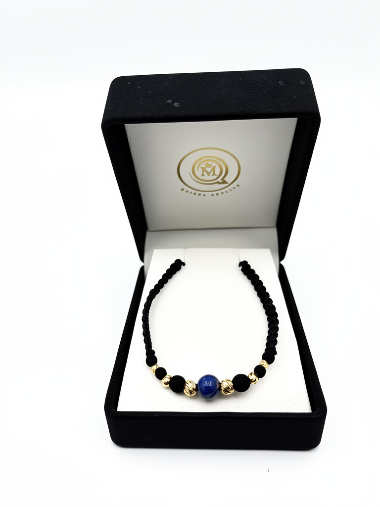 Pulsera negra con piedra azul