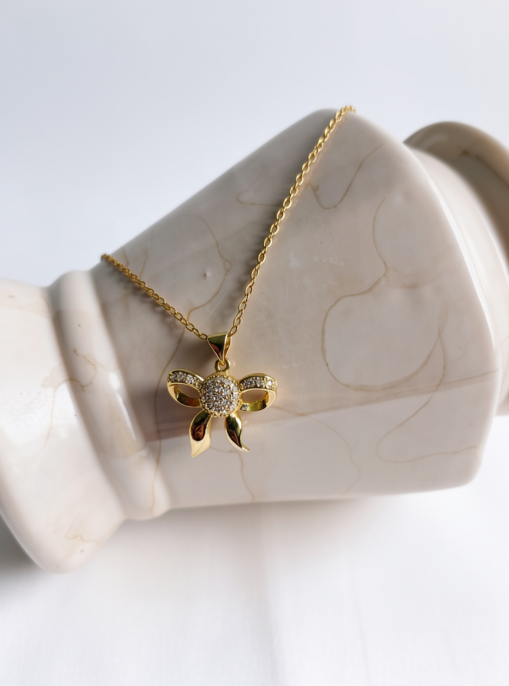 COLLAR LAZO CON CIRCONES ACERO INOX. GOLD