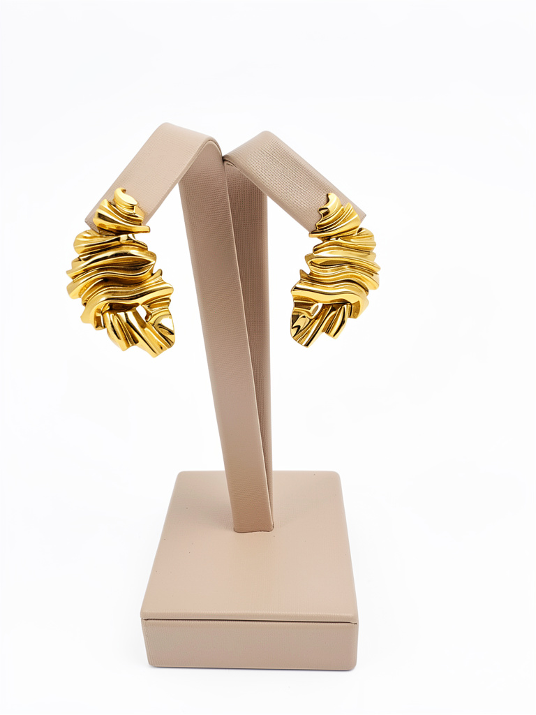 Aros esculturales ondas doradas