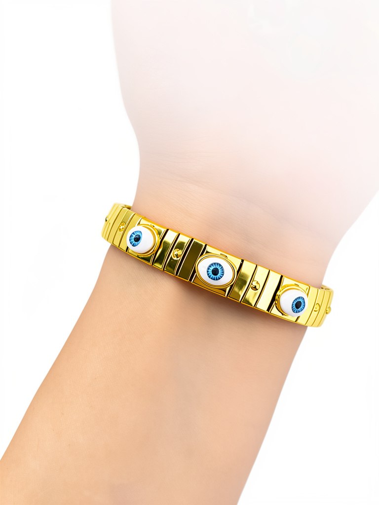 Brazalete dorado 3 Ojos