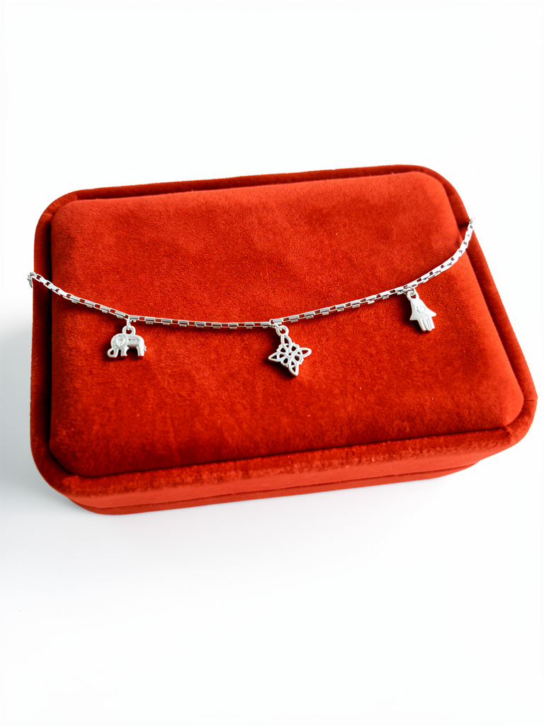 Pulsera de elefante, nudo de bruja y mano de Fátima