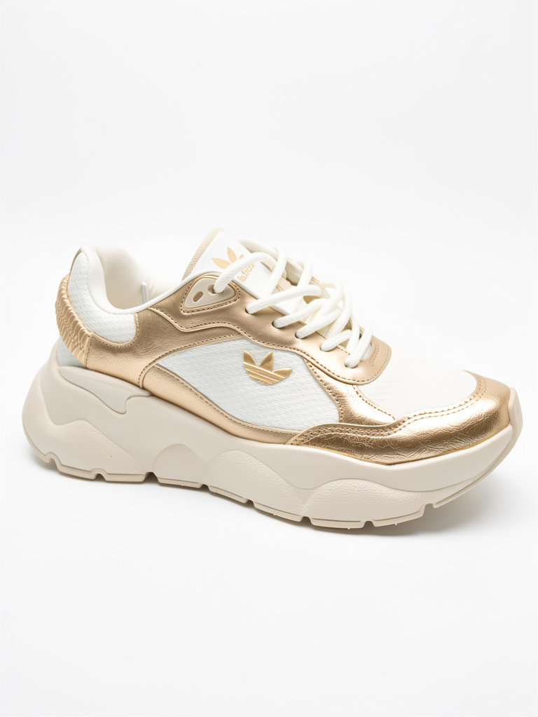 Adidas zapatilla blanca y dorada