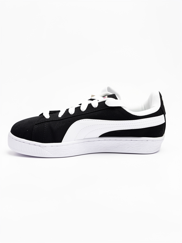 Puma negras y blancas deportivas