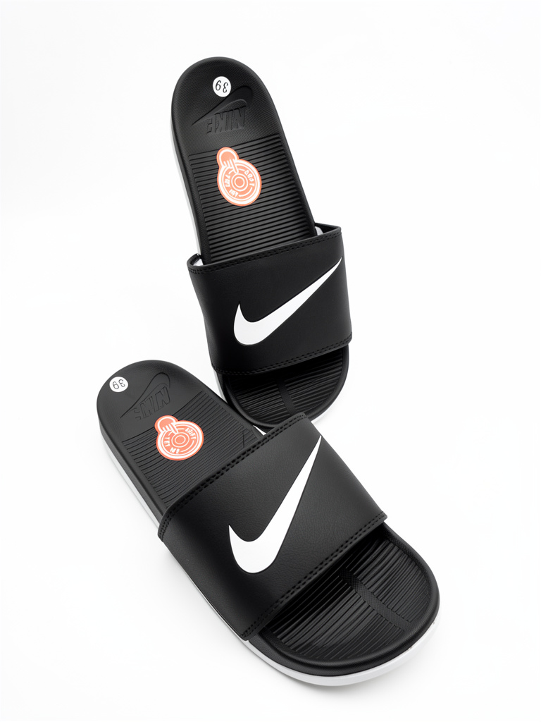 Nike conford slide negra con blanco