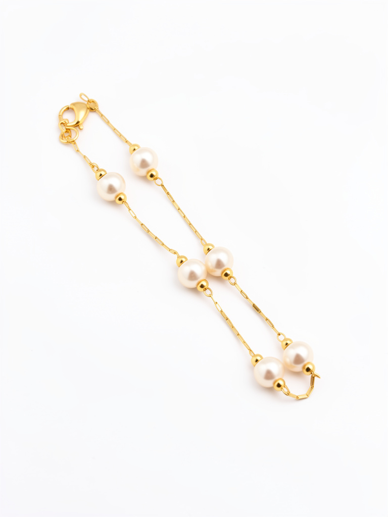 Pulsera Acero Dorado y Perlas