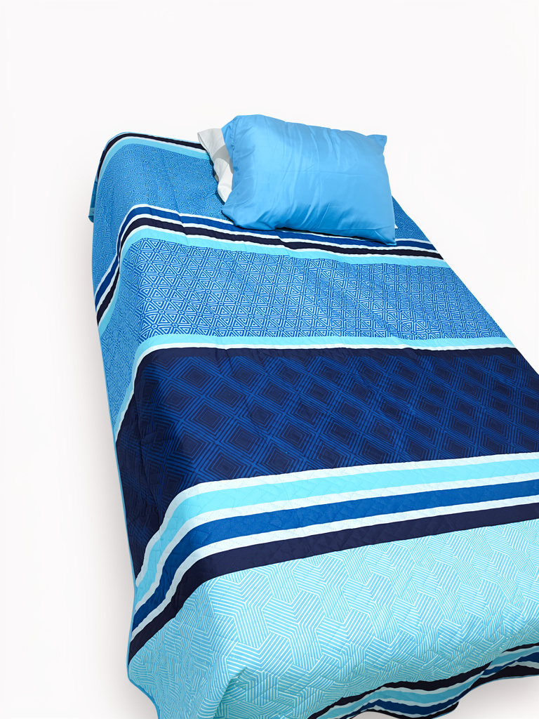 Juego de cama azul. Tamaño twin.