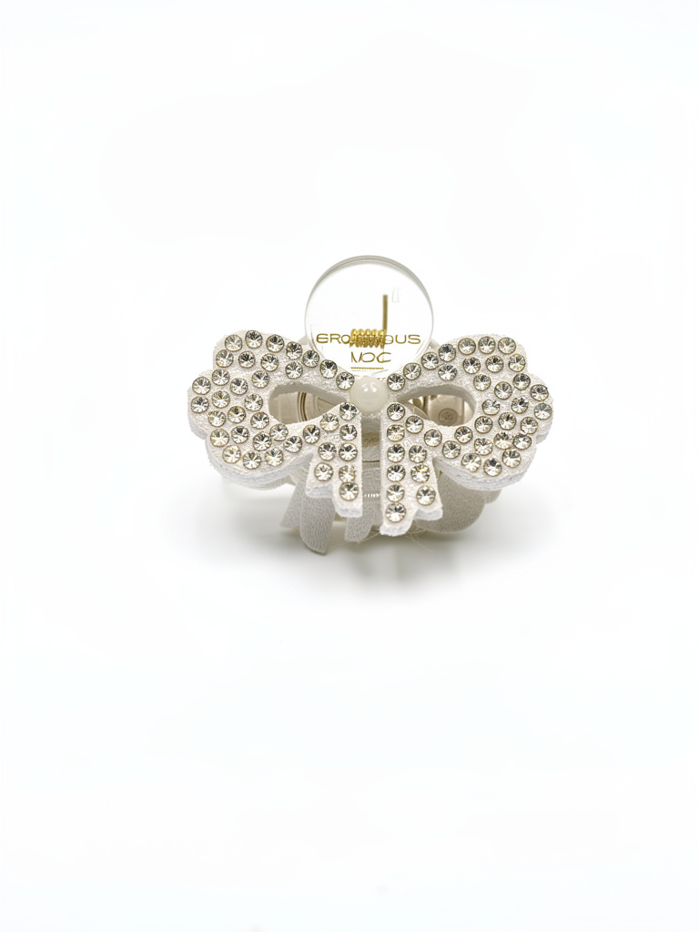 BROCHE MOÑO STRASS