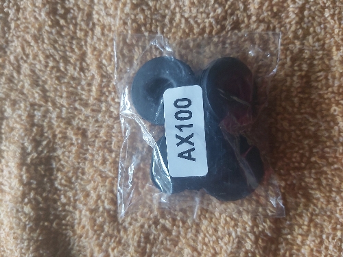 Caucho tapas laterales ax100/GN125 leixa