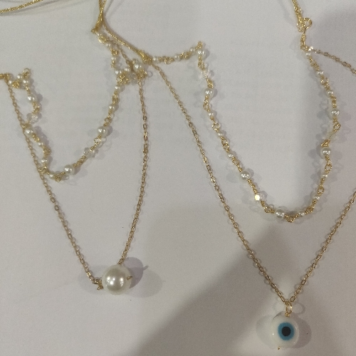 CADENA LAMINADO FABRICADO PERLAS CON DIJES DE OJO TURCO, PERLAS, ESTRELLA EN NACAR CDL00011