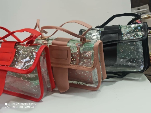 BOLSO TIPO CARTERA TRANSPARENTE CON ESTRELLAS DIFERENTES COLORES BOL000716