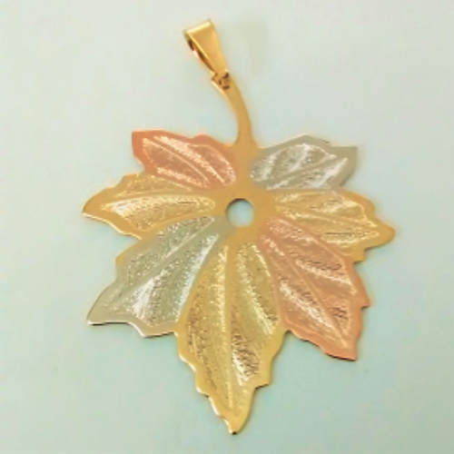 DIJE EN LAMINADO HOJA EN LAMINA LABRADA EN CARTIER  DLD00113