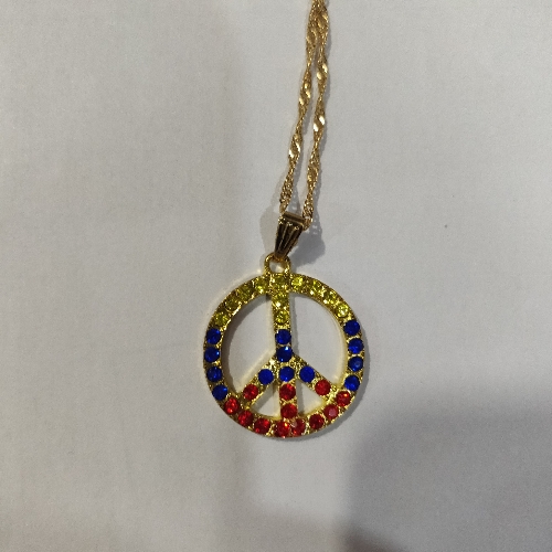 DIJE EN LAMINADO SIMBOLO DE LA PAZ EN TRICOLOR  /M   DLD002523