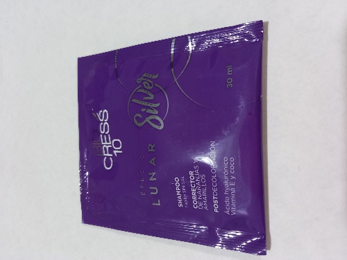 Shampoo efecto lunar Silver corrector de naranjas y amarillos sobre 30 ml