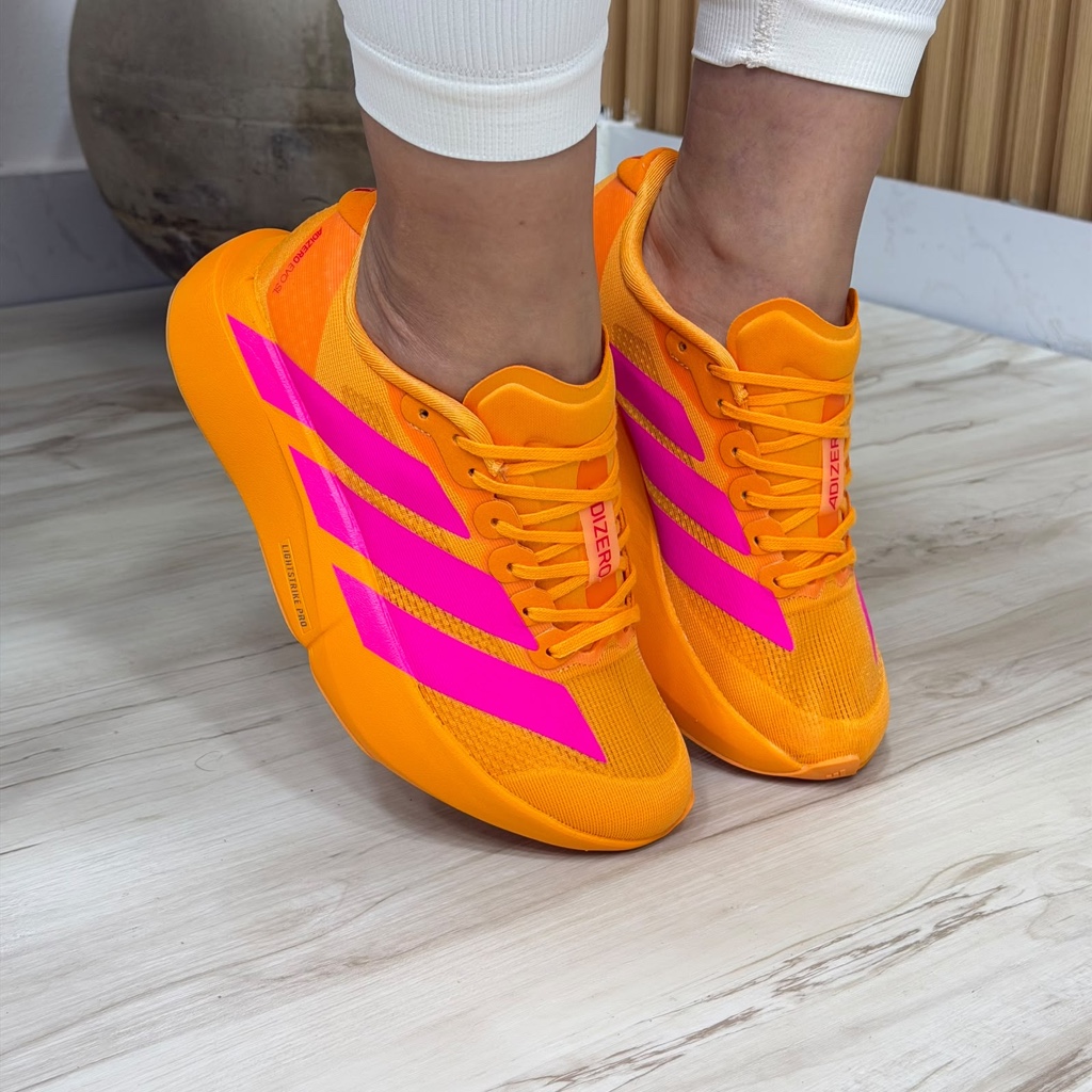 Adizero tenis naranja fucsia