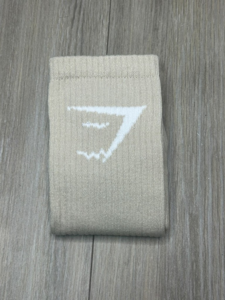 Calcetin beige con logo blanco gymrat
