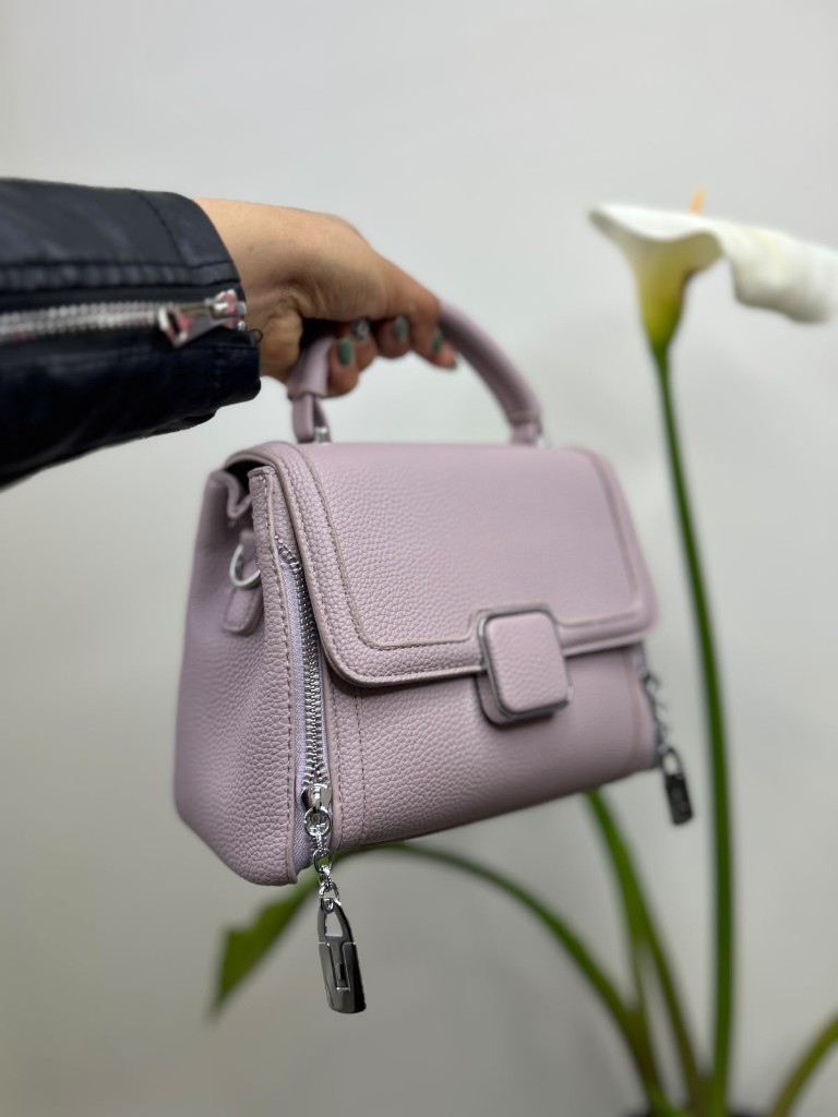 Cartera rosada tipo bolso