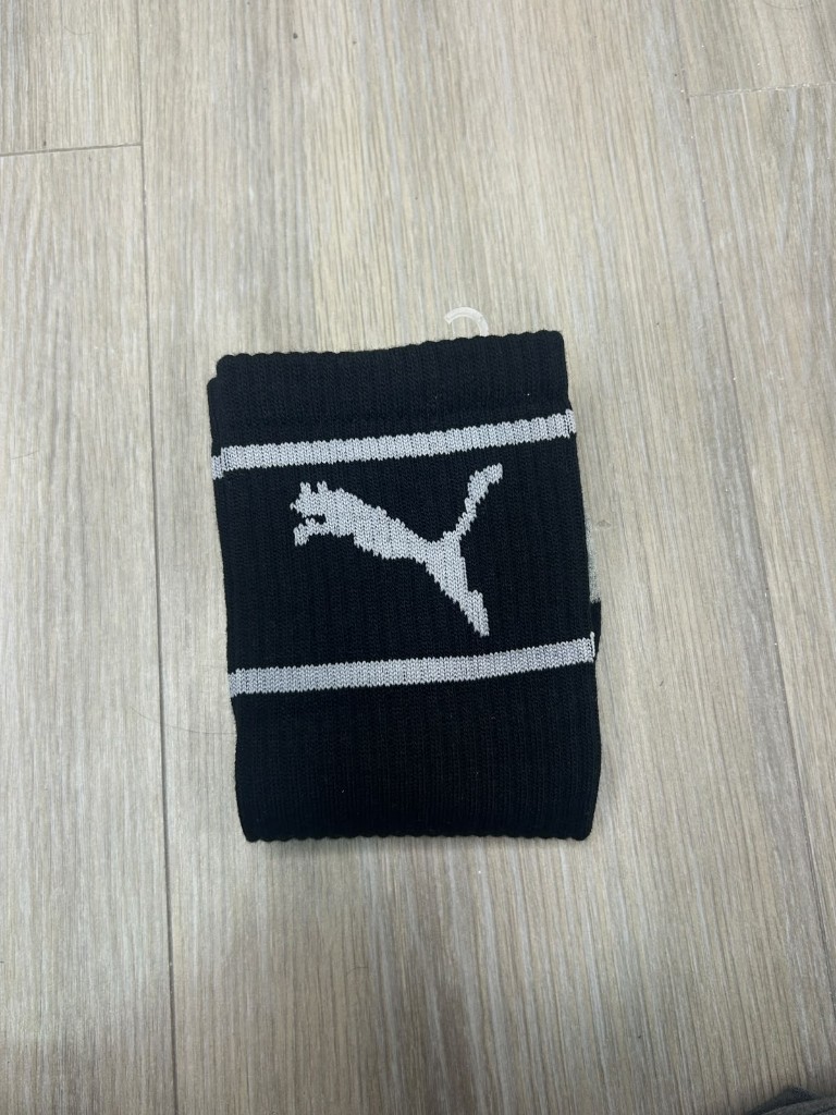 Puma calcetin negro logo blanco