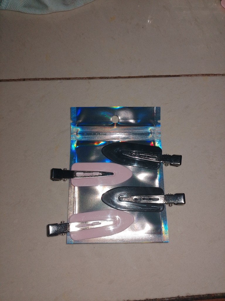 Par pinzas para cabello  rosa y negro
