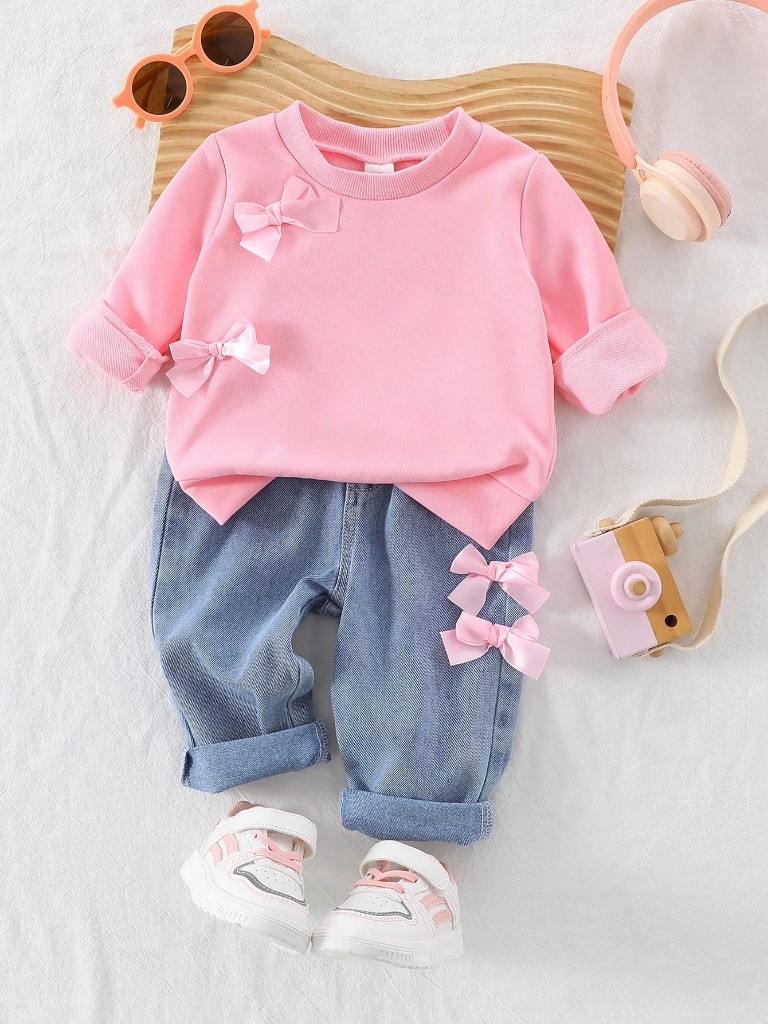 Conjunto de Pantalón y Lazos con Suéter rosa con Lazos