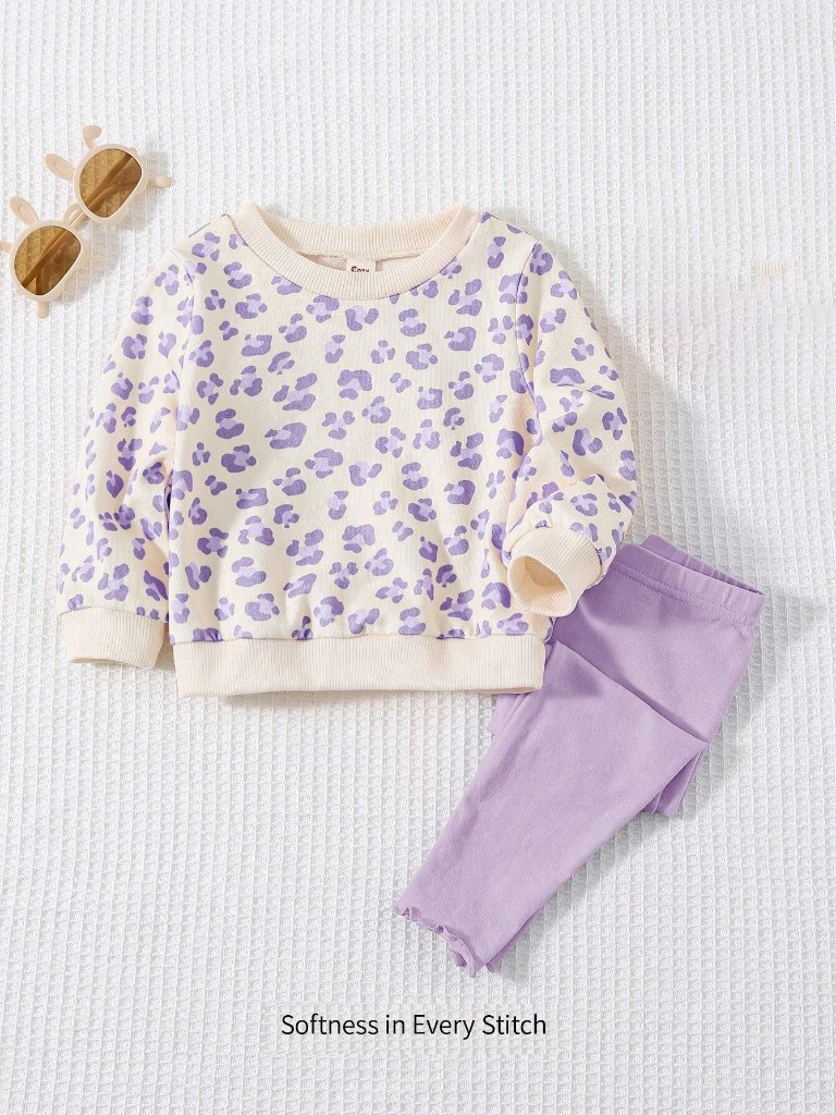 Conjunto suéter manga larga y mono estampado