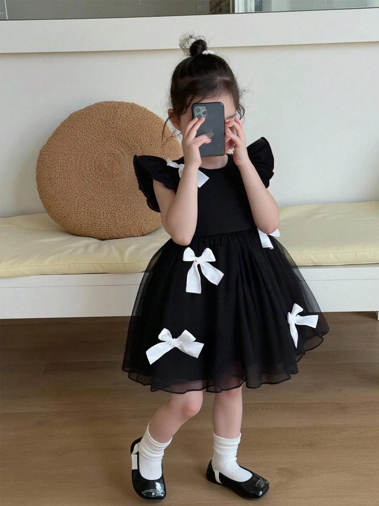Vestido negro con Lazos blancos