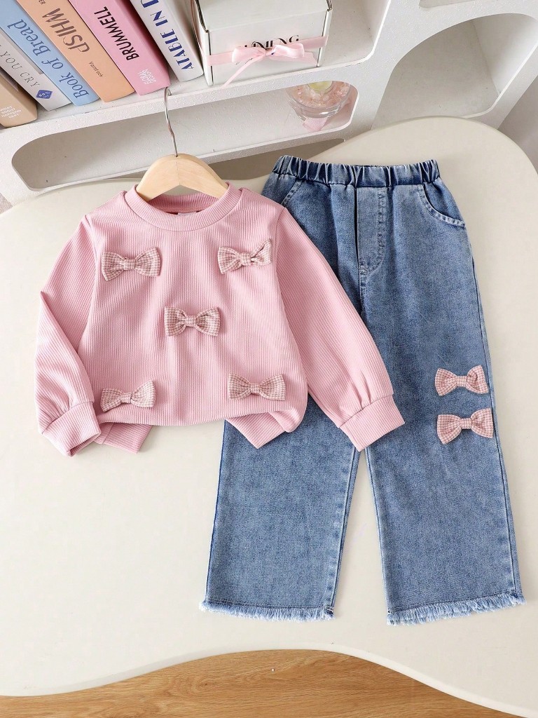 Conjunto de Pantalón de Jean y Suéter rosado de lazos