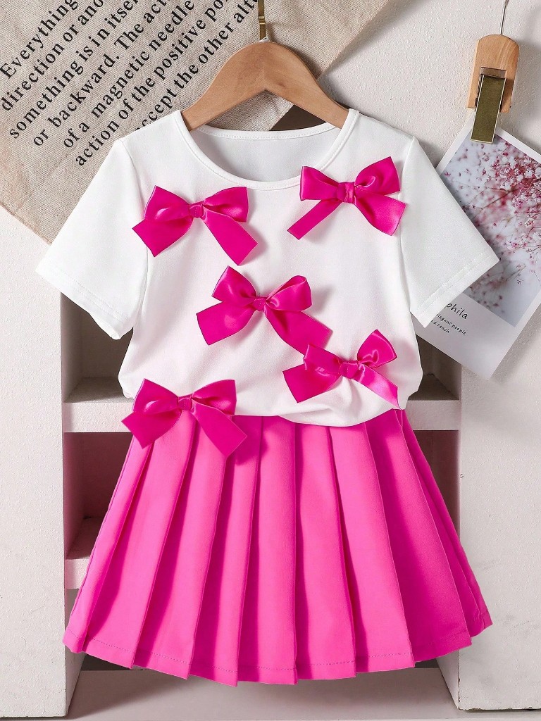 Conjunto Falda fucsia y Franela blanca con Lazos fucsias
