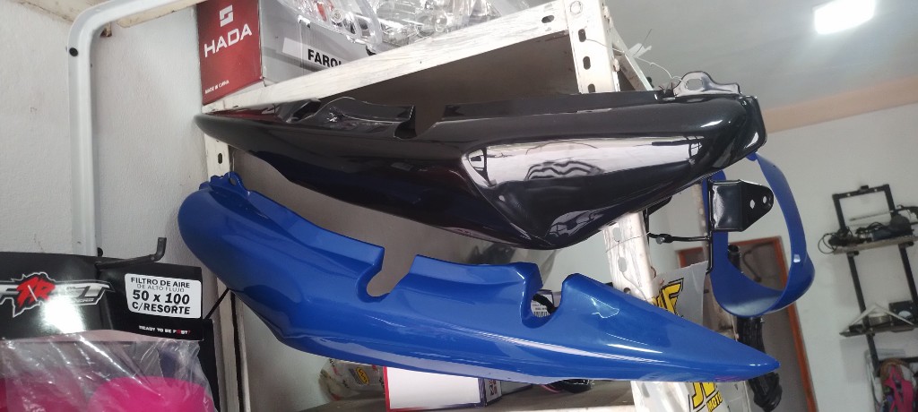 Cachas laterales titan 150