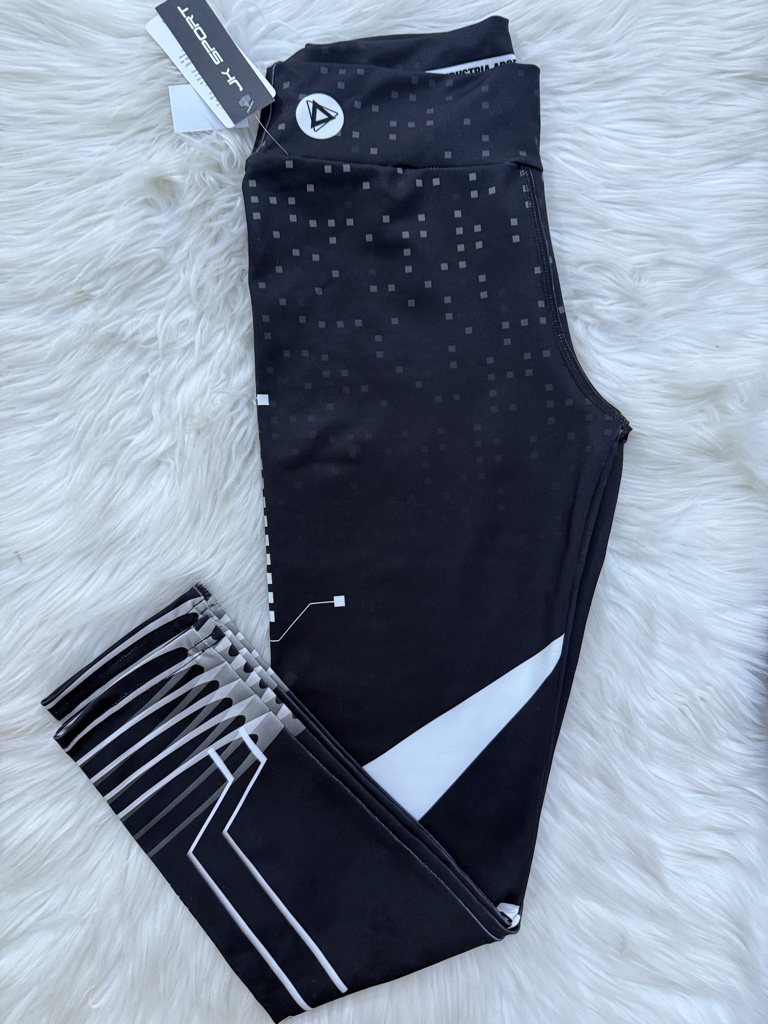 Calza negra con detalles en blanco talle M