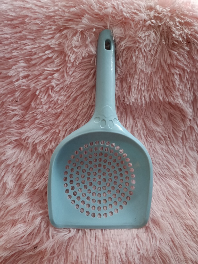 Pala sanitaria azul círculos pequeños