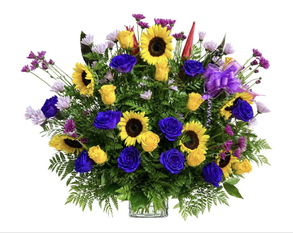 Sunflower and Purple Rose Arrangement(Sunflowers, Purple Roses, Yellow Roses, Purple Daisies, Greenery, Purple Bow in a Vase with Bow)