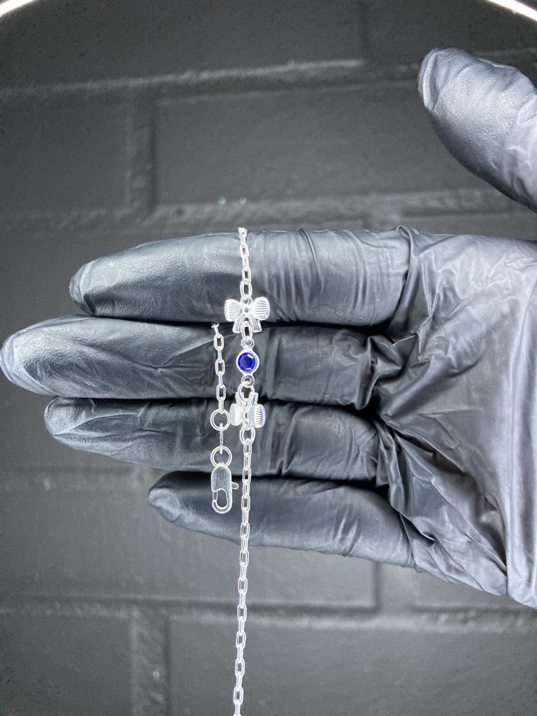 Pulsera eslabones finos con lazos y un punto de luz azul