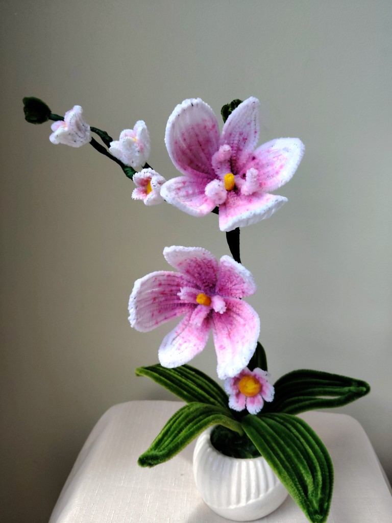 Orquidea rosa artificial
